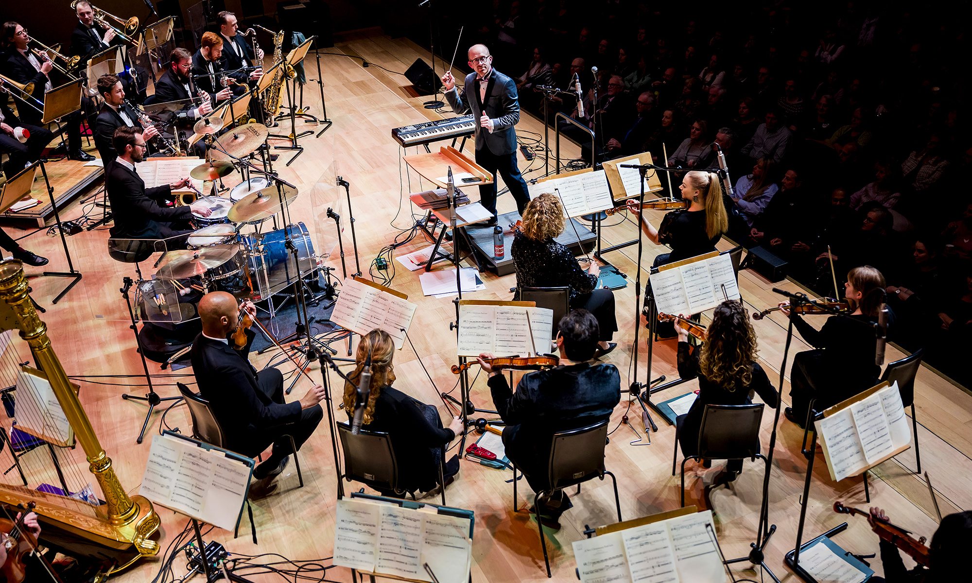Conductor Mike Paul-Smith directing The Down for the Count Orchestra at Cadogan Hall, London